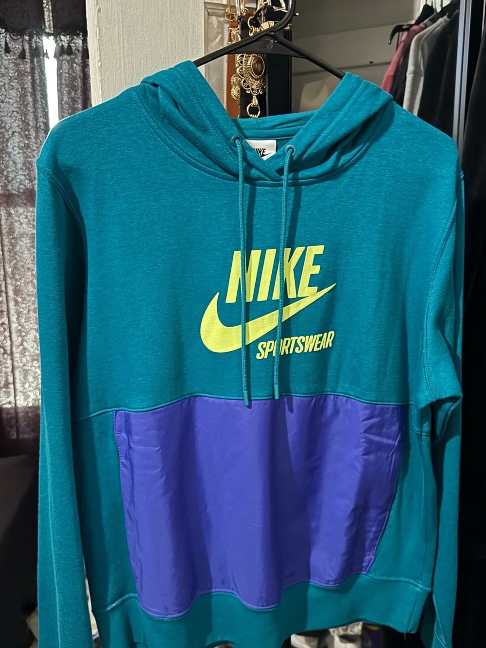 Nike women’s Teal Zip-Up Hoodie with Purple Front Panel and Yellow Logo
